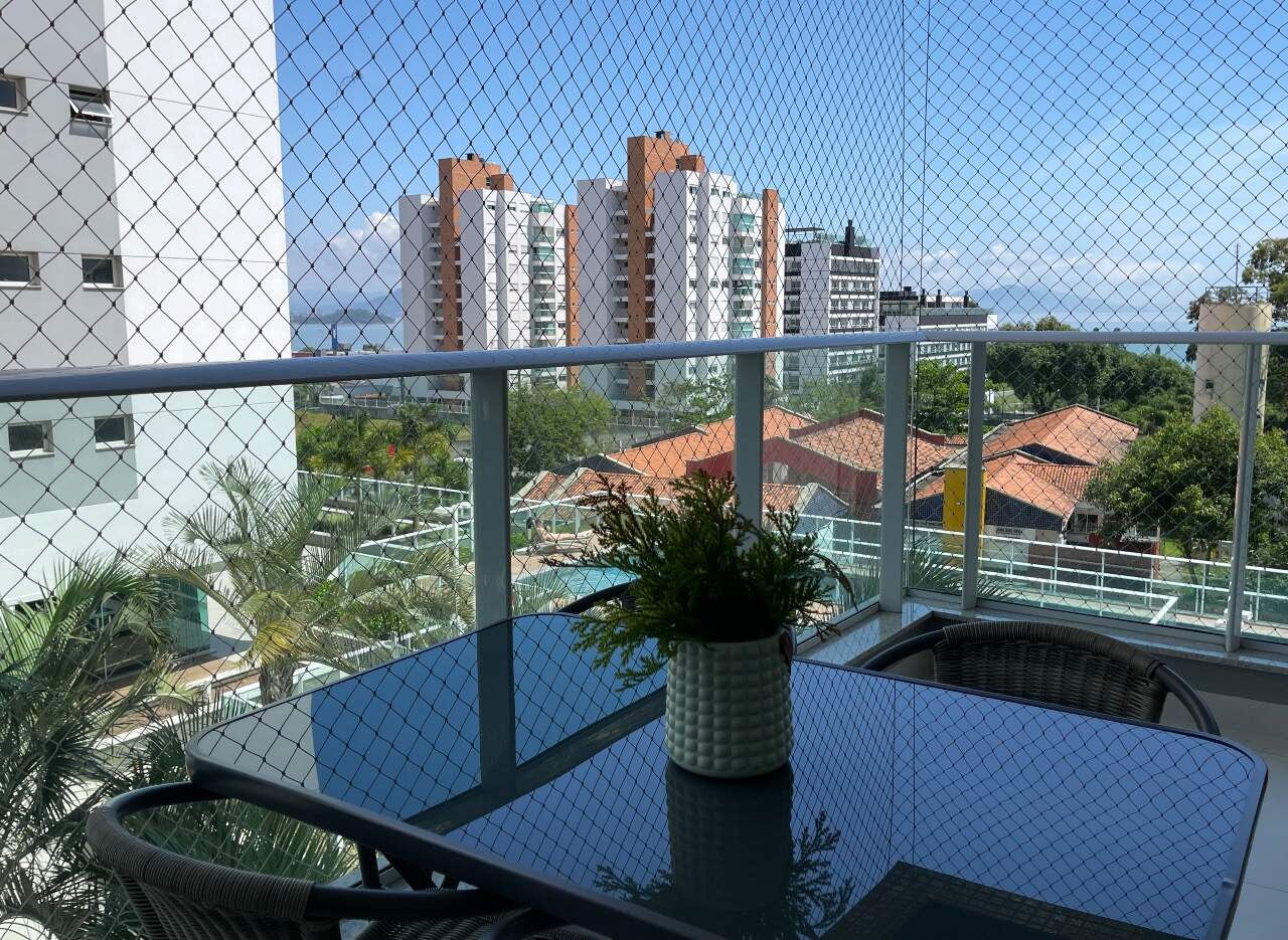 Apartamento[ NumeroQuarto] Jardim Atlântico Florianópolis Jardim Poente: Vista parcial mar da sacada
