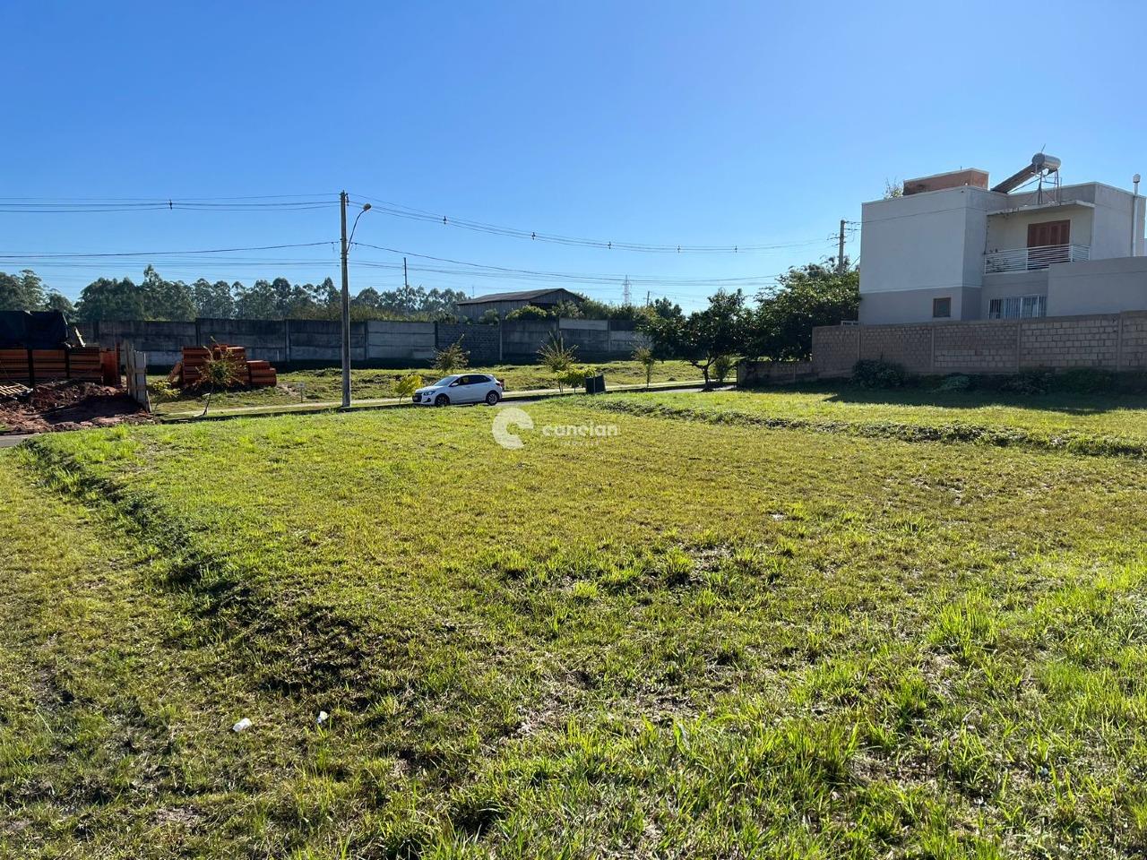 Terreno em condomínio à venda no Camobi: Foto fundos