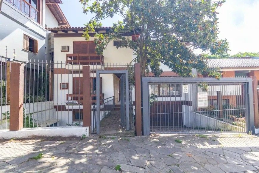 Casa com 5 quartos para aluguel, 350m² - Nonoai - Porto Alegre: 